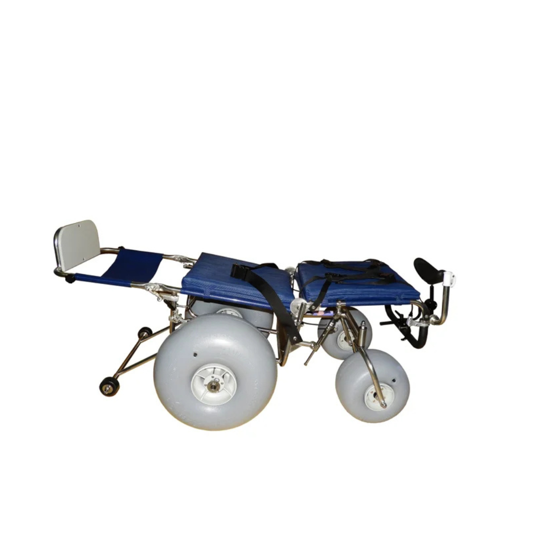 The DeBug All-Terrain Beach Wheelchair, shown in blue and silver, features large balloon wheels, a reclining seat, adjustable armrests, and a footrest for outdoor mobility—all pictured against a plain white background.